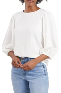 a top with three-quarter length sleeves